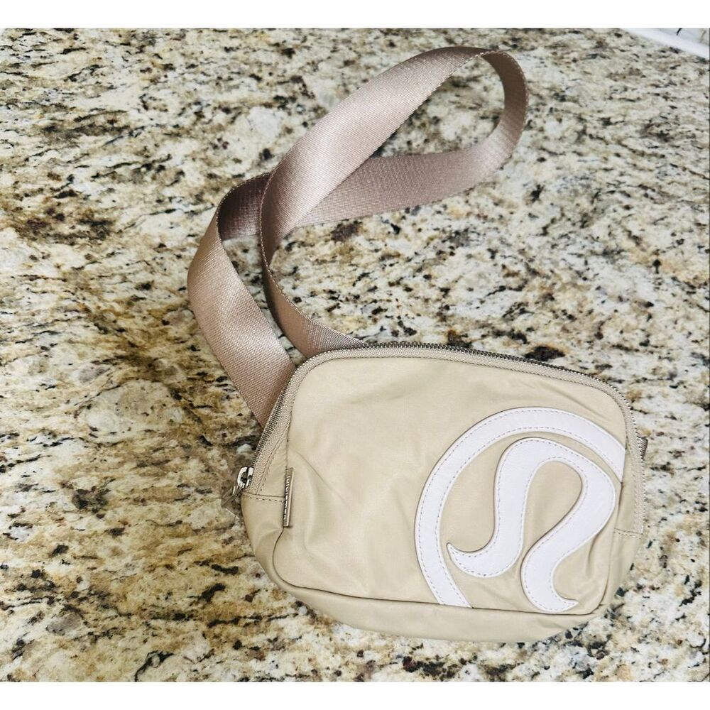 🌸 Lululemon Athletics Beige and White Large Logo Front Beltbag
